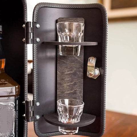 Inside view of Dope Fire Extinguisher Mini Bar, showing lockable storage for two shot glasses and a bottle compartment.