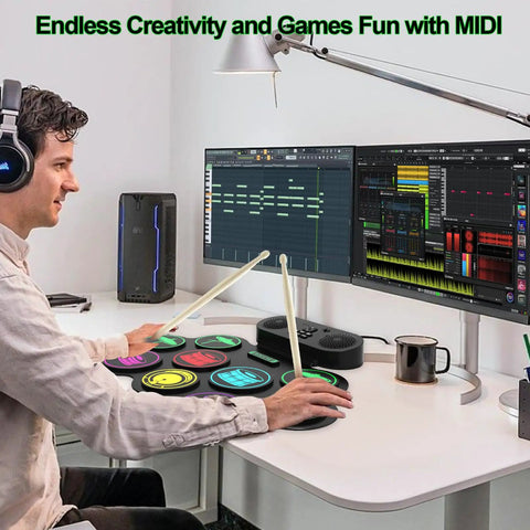 User playing Roll Up 9 Pad MIDI Electronic Drum Set With Headphone Jack Built In Dual Speakers at desk setup with monitors