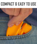 Yellow Two Step Knife Sharpener With Coarse And Fine Slots being placed in a jeans pocket, compact and portable design