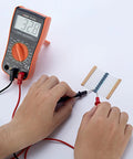 Testing resistors from Massive 1000 Pack Metal Film Resistor Kit With 50 Values 0.25W 1% Tolerance using a multimeter.