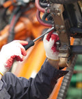 Person using a screwdriver from the Essential 39 Piece Household Tools Kit For Dorm And Home DIY Projects for equipment maintenance.