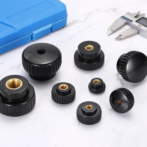 Badass Knurled Thumb Nuts M10 X 50mm Black Clamping Fasteners With Copper Core Lock Hardware For 3D Printers Cnc Machines Shop Workstations Smooth Grip Round Knobs No Sweat Setup Today set on a marble surface.