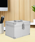 Heavy Duty Kickass Portable Aluminum Toolbox Featuring Reinforced Double Layer Storage And Secure Locks Designed Tough For Engineering Fieldwork And Jewelry Cases, silver case on desk.