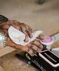 Person using Heavy Duty Cleaning Wipes For Paint Prep And Degreasing On The Go, Travel Size Flat Pack For Hands And Tools