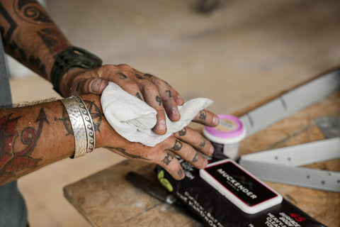 Person using Heavy Duty Cleaning Wipes For Paint Prep And Degreasing On The Go, Travel Size Flat Pack For Hands And Tools