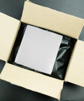 Open cardboard box with 100 Pack White EPE Foam Bubble Pouches For Bombproof Shipping And Handling Of Fragile Items