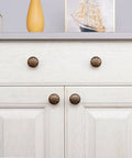 Antique Brass Cabinet Knobs Set Of 4 1.4 Inch Round Vintage Dresser Drawer Handles For Cabinets And Furniture Rustic Flower Shaped Design Durable Zinc Alloy Finish on white dresser
