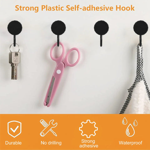 Black Self Adhesive Hooks 20 Pack Tough As Nails Sticky Wall Hangers With Super Grip Nail Free Organizers For Cabinet Door Closet Rust Proof Space Saving Storage with keys and scissors mounted.