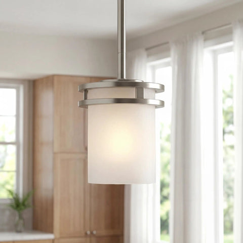 Hendrik 1-Light Mini Pendant With Brushed Nickel Finish And Satin Etched Cased Opal Glass Shade shown in a modern kitchen setting.