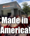 Exterior of DeckWise building with sign, emphasizing the message 'Made in America!' on American flag background.