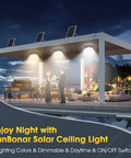 A modern patio with Solar Ceiling Light With Remote Control, Dimmable Daylight To Warm White, 1000 Lumen Outdoor Solar Shed Light.