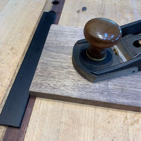 Beefy Aluminum Planing Stop Board For Woodworking Your Go To Workbench Baffle alongside wood plane on workbench