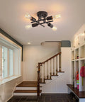 4-Light Black Semi Flush Mount Ceiling Light Fixture With Dope Industrial Farmhouse Metal Design in entryway setting