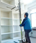 Heavy Duty Manual Winch Material Lift With Smooth 60 To 80kg Load Support For Easy Cabinet Board Installation and Warehouse Storage Work in use.