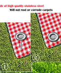 Heavy Duty Outdoor RV Rug Stakes 6 Inch Stainless Steel Spira Mats Stakes securing red checkered rug on grass.