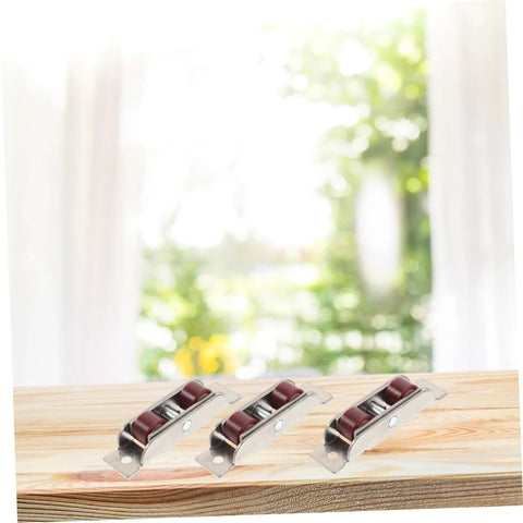 Heavy Duty Double Wheel Window And Door Pulley Replacement Rollers With Sweet Smooth Glide Premium Stainless Steel Sash Track Hardware displayed on a wooden surface.