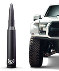 Beefy 50 Cal Bullet Antenna For Ford F Series F150 F250 F350 Super Duty Raptor Bronco 2021 2022 2023 And Ram 1500 next to truck
