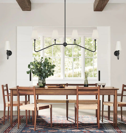 Dining room setting with 47 Inch Four Light Linear Kitchen Island Pendant In Matte Black With White Linen Shades Dope Modern Look