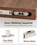 Close-up of sliding barn door components, including floor guide and bottom wheel for Solid As A Rock Concealed Sliding Barn Door Hardware Kit.