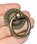 Close-up of 8-Piece Bronze Drawer Ring Pulls Set With Screws For Dresser Cabinet Wardrobe Chest Closet Vintage Decorative Hardware