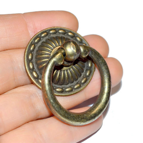 Close-up of 8-Piece Bronze Drawer Ring Pulls Set With Screws For Dresser Cabinet Wardrobe Chest Closet Vintage Decorative Hardware