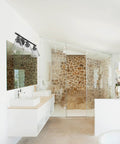Modern bathroom with stone wall shower and oil rubbed bronze all in one bathroom set with 3 light vanity fixture and coordinating accessories.