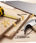 24 Pack Zinc Alloy Dowel Pins arranged on wooden boards with a tape measure and tools for cabinet setup.
