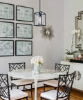Black Pendant Light For Kitchen Island And Dining Room With Seeded Glass In A Sturdy Metal Cage Fixture Farmhouse Style 1 Light Hanging Ceiling Lamp For Over Sink Bar Or Breakfast Nook Dope Rustic Glow above dining table with floral decor.