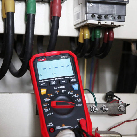 Pro Grade Digital Multimeter With True RMS, 22K Counts, 1000V AC DC Range, testing electrical connections in a panel