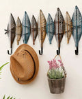 Hella Sturdy Wall Mounted Coat Rack With Reinforced Hooks For Clothes Hats And Robes Totally Multipurpose Entryway Organizer with decorative leaves.