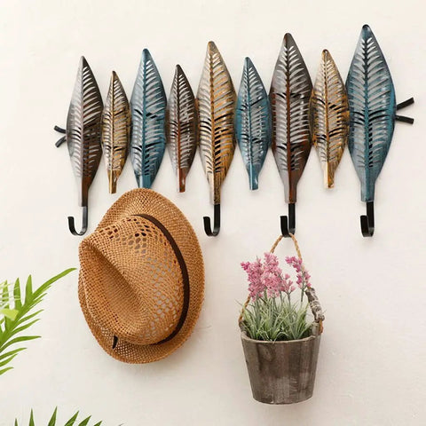 Hella Sturdy Wall Mounted Coat Rack With Reinforced Hooks For Clothes Hats And Robes Totally Multipurpose Entryway Organizer with decorative leaves.