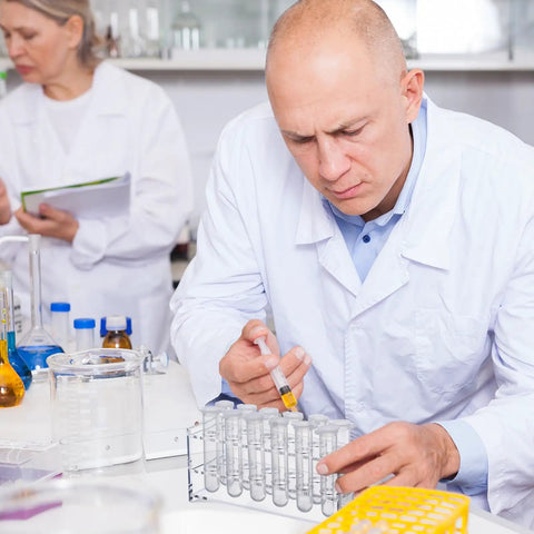 Scientist using Two Piece Acrylic Test Tube Holder Rack With 12 Socket Vial Stand, Clear Lab Organizer in lab setting
