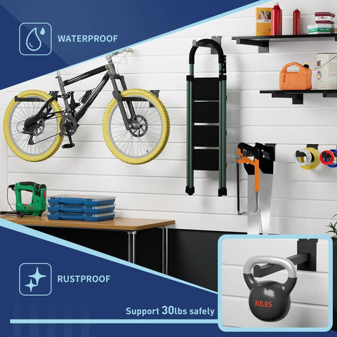 Garage with Sixteen Pack Heavy Duty Tubular Slatwall Shelf Brackets With Lip holding bike and tools on slatwall.