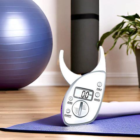 Digital Body Fat Caliper With LCD Screen And Tape Measure For Accurate Body Fat Percentage Easy Home Fitness Tracker For Progress And Health Monitoring on yoga mat
