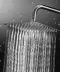 8 Inch Stainless Steel Rain Shower Head With High Flow Output, Square Rainfall Design, High Pressure Performance For An Epic Spa Like Shower, Chrome Finish, Durable Solid Metal Construction For Lasting Use spraying water