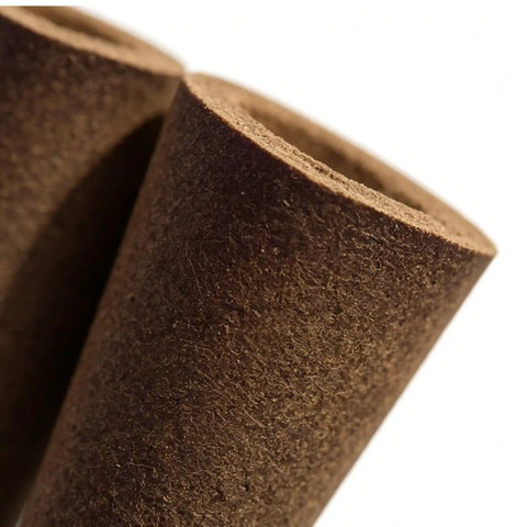 Close-up of cone shaped grow sponges for cloning and germination, showing texture and material of plant starter pods.