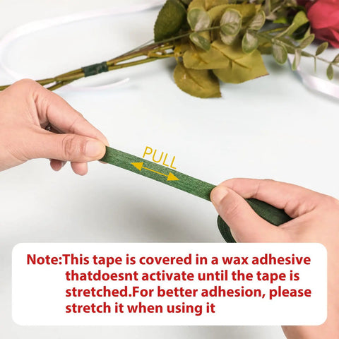 Hands stretching green floral tape from DIY Floral Arrangement Kit With Green Floral Tape And Wire For Boutonniere And Bouquet.