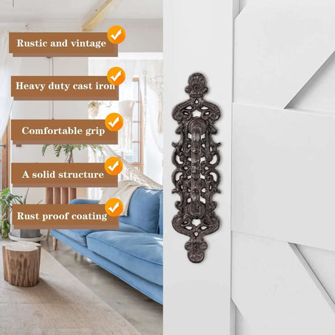Two Piece Rustic Cast Iron Door Handle Set For Barn Doors Cabinets And Drawers in antique black with decorative design on white wood.