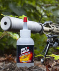 Front view of Vibra-TITE Hot-Lock Extreme High Temperature Threadlocker bottle, translucent plastic, 2 oz with red cap