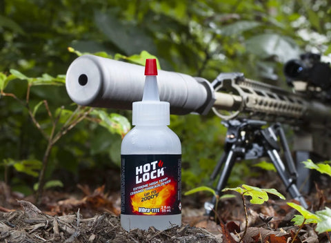 Front view of Vibra-TITE Hot-Lock Extreme High Temperature Threadlocker bottle, translucent plastic, 2 oz with red cap