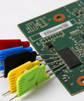 Ultra Small IC Clip Test Probe For SOIC TSSOP TSOP SSOP MSOP PLCC QFP TQFP LQFP And SMD Chips attached to a green PCB.