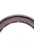 DMHUI rotary shaft seal ring, brown rubber, 55-70-7mm, close-up view