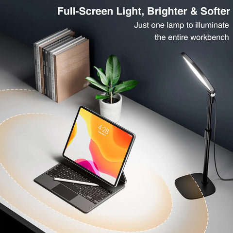 Full-screen light illuminating a workbench with tablet and plant, showcasing Adjustable Desk Ring Light With Stand For Webcam And Video Calls.