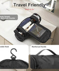Hanging Toiletry Bag For Men And Women, Waterproof Nylon Dopp Kit with compartments on bathroom counter