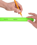 Shatterproof 12 Inch Ruler In Green With Crystal Clear Markings, Ultra Durable Plastic Measuring Tool For Home, School Or Office being used