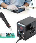 Hot Air Rework Station 700W 110V with three nozzles for SMD soldering, desoldering, and repair, shown with gloves and circuit board.