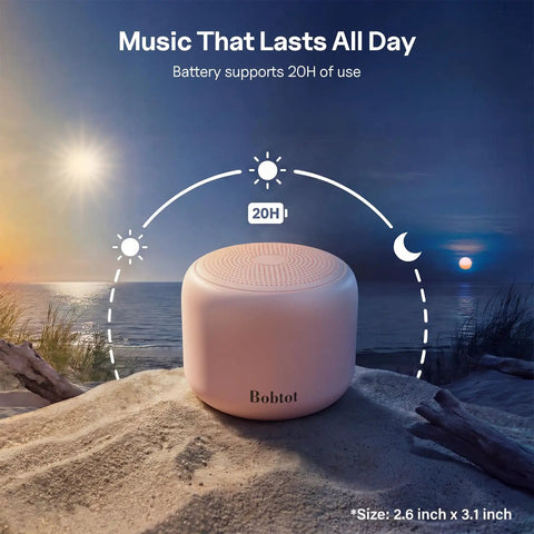 Ultra Portable Bluetooth Speaker With Strap For On The Go IPX5 Waterproof Mini Speaker That Bangs With Loud Stereo Sound 20 Hours Of Playtime Rechargeable Battery Built In Microphone Pink in desert setting