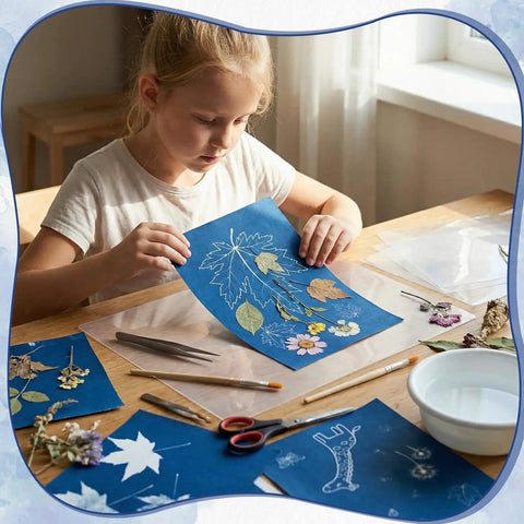Child using Dope Sun Print Cyanotype Kit With 30 Sheets Of Paper And Acrylic Panel for nature crafts on a table