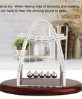 Newton Cradle Desk Toy With Clinking Pendulum Balls Calming Stress Relief For Home Office Decor Educational Gift For Students And Kids Ideal Desk Accessory For Focus, Breaks, And Chill Mindful Learning on a wooden base