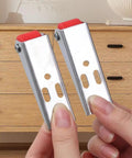 Top Shelf Set Of Four Stainless Steel Cabinet Door Rollers Paired With Heavy Duty Galvanized Track And Durable Plastic Gliders For Smooth As Butter Bottom Casters held in hands.